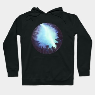 Aurora Borealis glowing above pine forest Hoodie